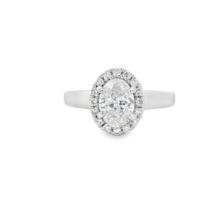 Estate Platinum Halo Engagement Ring set with 1 0.80 ct Oval Diamond, G SI2, and 16 Round Diamonds, 0.12 ctw