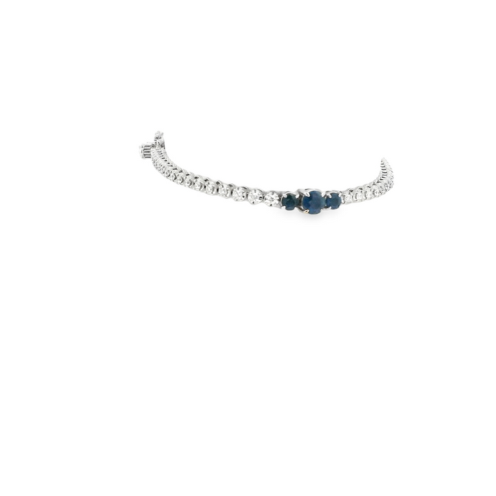 14K White Gold Line Bracelet set with 9 0.90 Ctw. Round Sapphires(s) Total stone weight for bracelet measures 1.38 ctw.