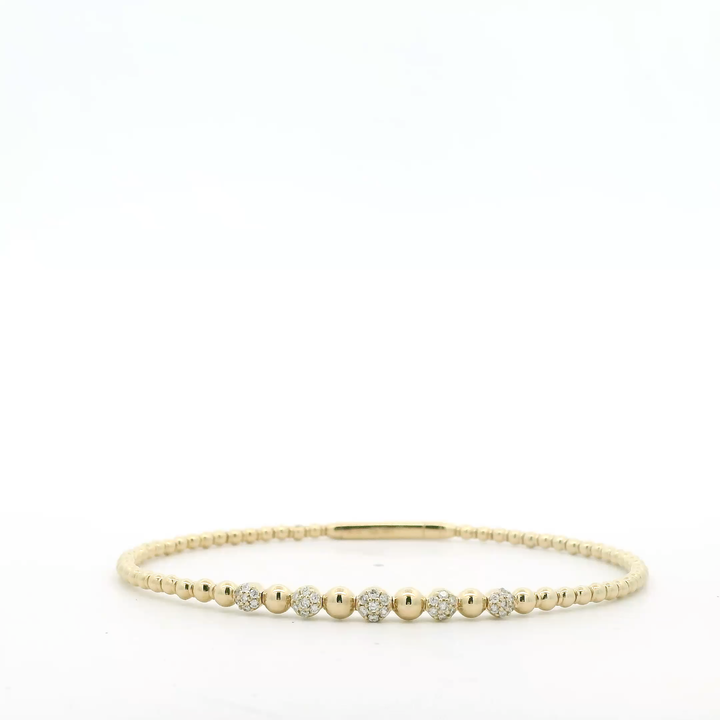 14K Yellow Gold Flexible Bangle set with 35 Round Diamonds, 0.19 ctw