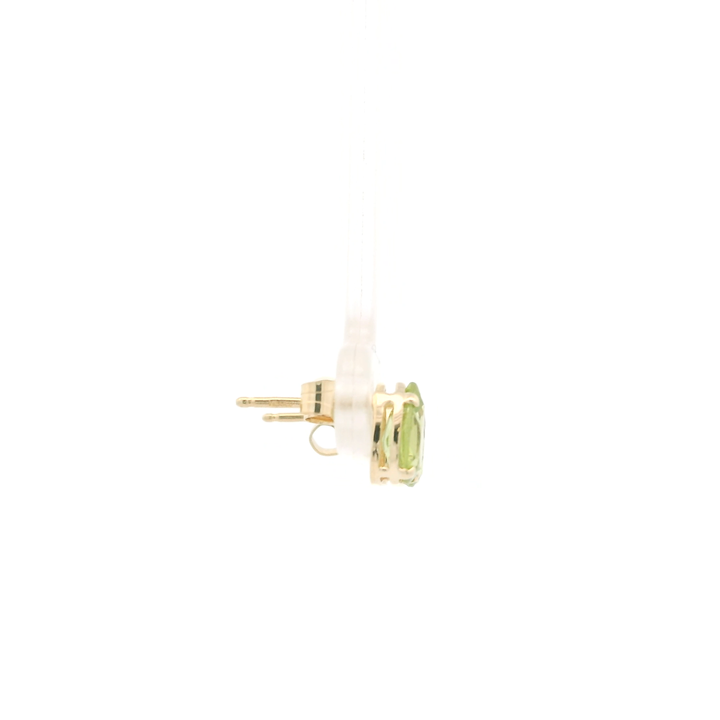 Estate 14K Yellow Gold Stud Earrings set with 2 Pear Peridot, approximately 1.50 ctw