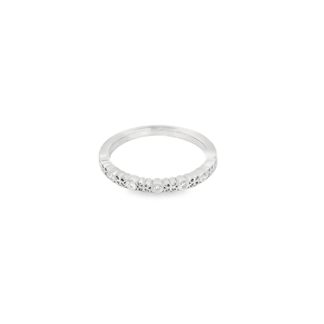 14K White Gold Bezel Set Anniversary Band set with 7 G/H SI1 - SI2 Diamonds total stone weight measures 0.08 ctw.