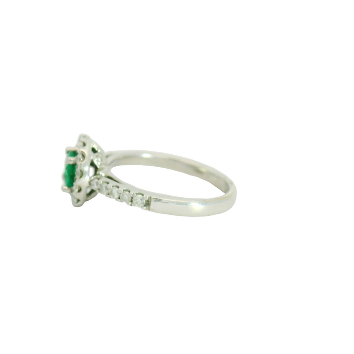 18K White Gold Estate Halo Gemstone Ring set with 1 Emerald, 0.50 ctw and 24 H/I, SI Diamonds 0.42 ctw,  total stone weight measures 0.92 ctw..