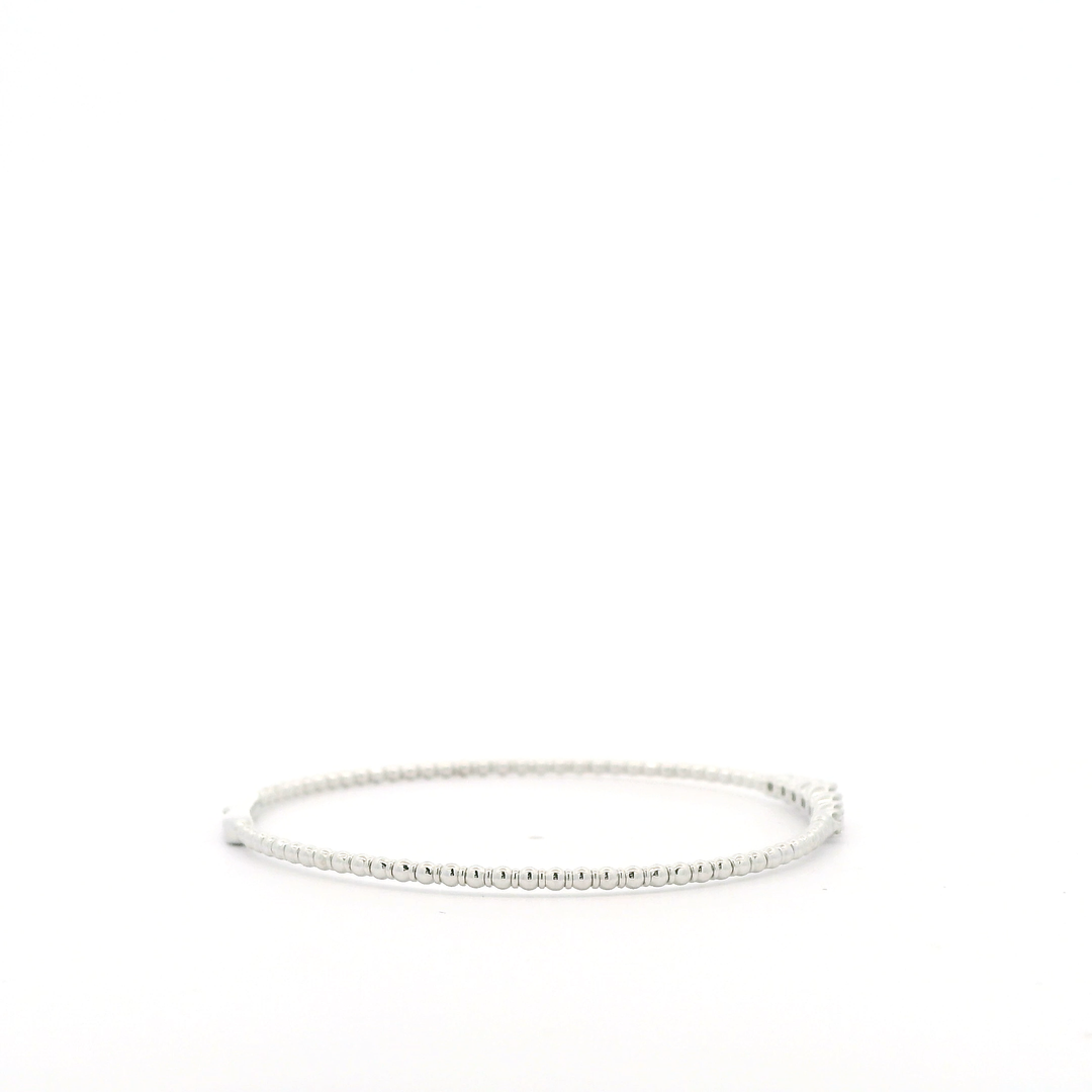 14K White Gold Flexible Bangle set with 7 Round Diamonds, 0.24 ctw
