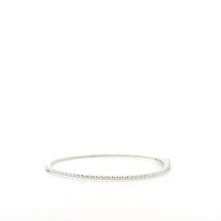 14K White Gold Flexible Bangle set with 7 Round Diamonds, 0.24 ctw